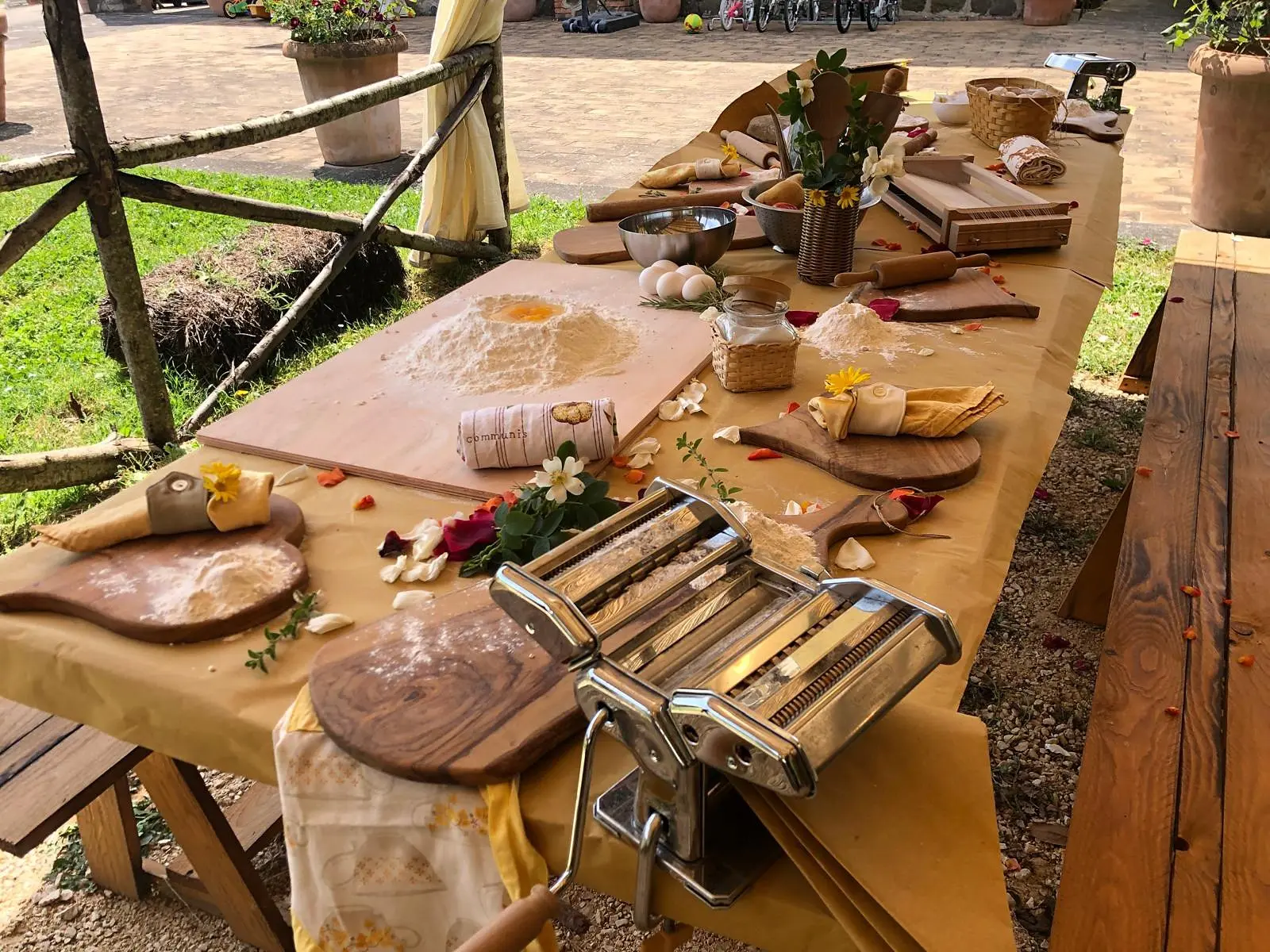 The cooking class table with the pasta machine