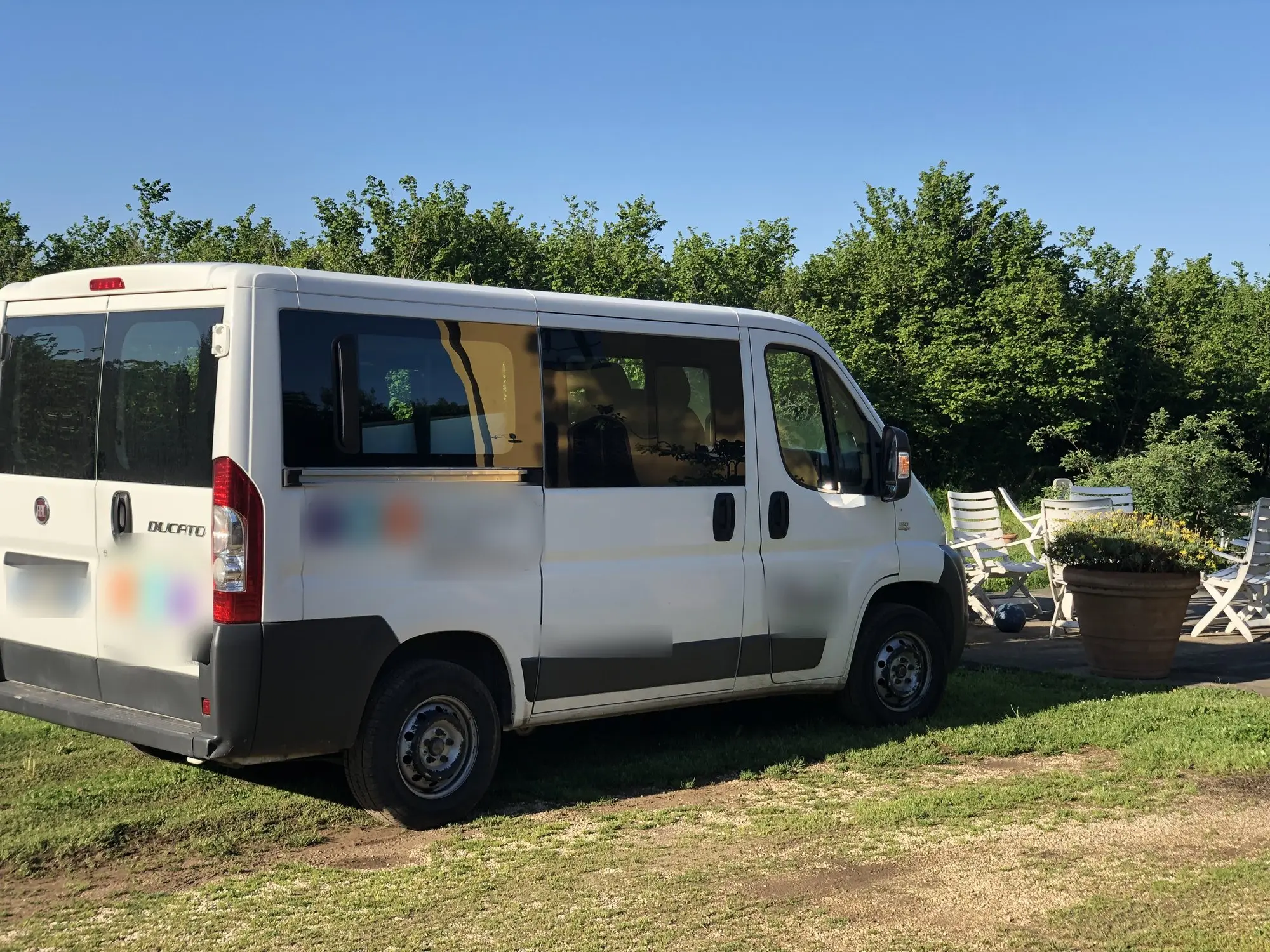 A minibus parked on the Casale lawn