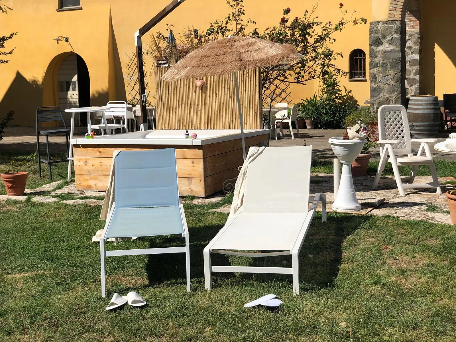 Sun loungers beside the Jacuzzi