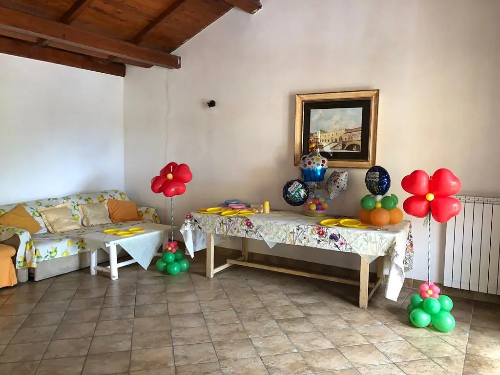 The room decorated with balloons for a party
